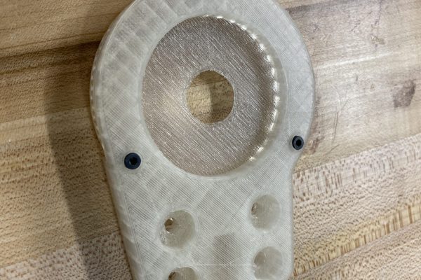 Three screws affix the outer ring gear to the body of the gearbox.