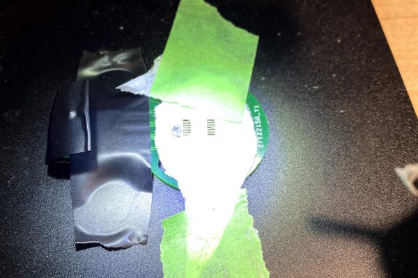 Designed a TSSOP-14_L5.0-W4.4-P0.65-LS6.5-BL stencil in illustrator and laser cut it from paper (kapton tape not available.)