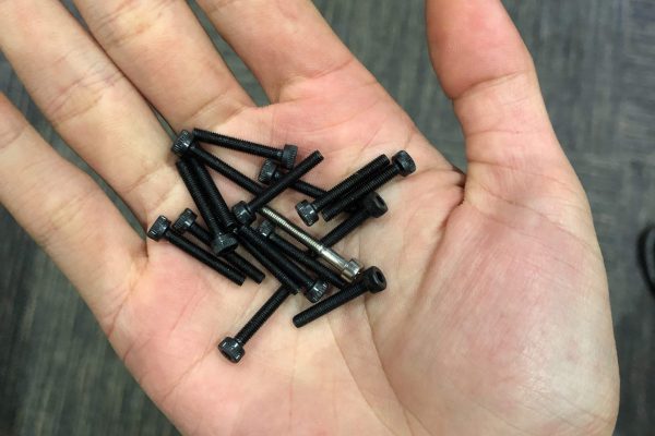 Metric socket head screws used as output pins.