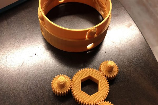 Prototype of initial stackable planetary gearbox design.